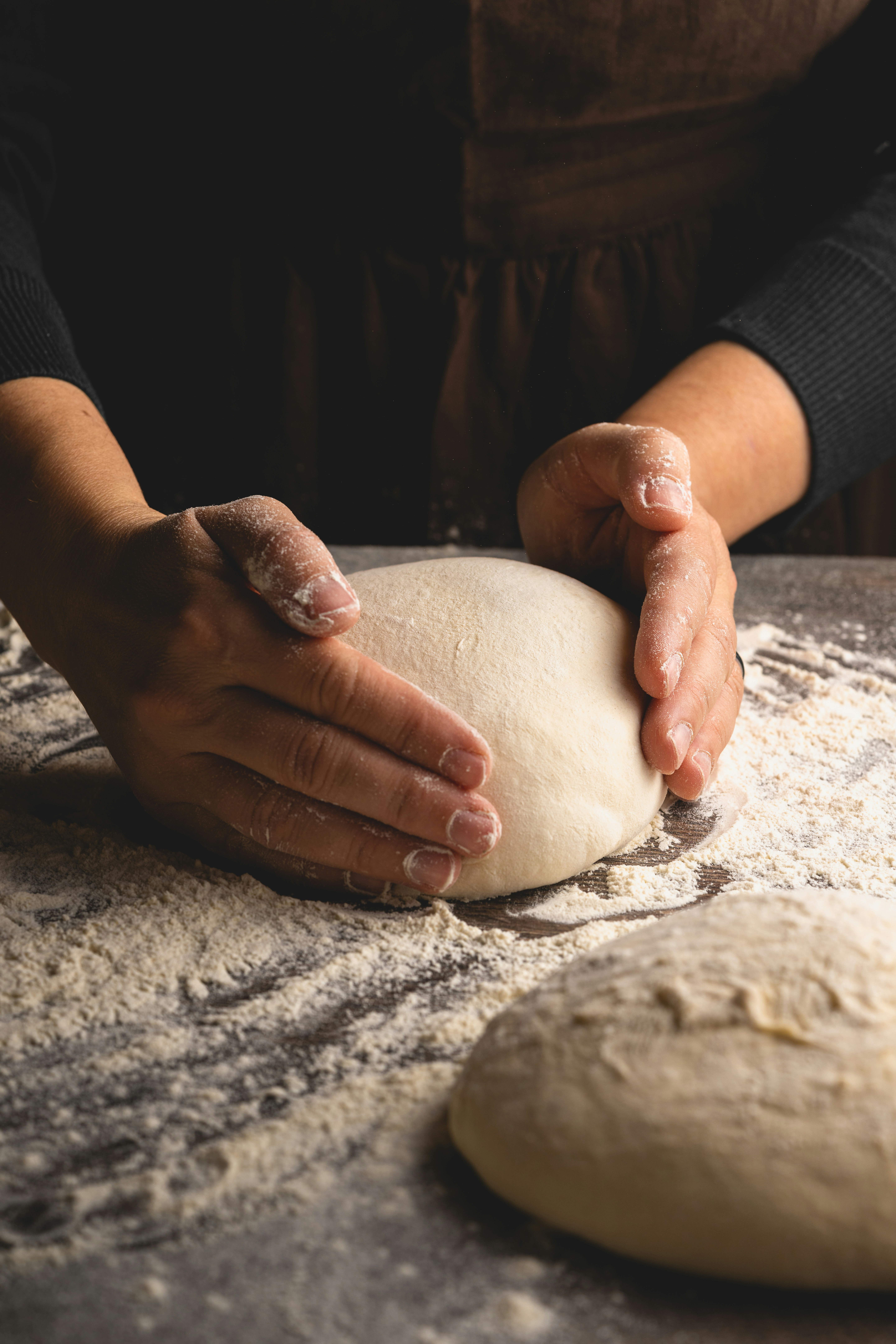 Pizza dough showing an open fermented structure